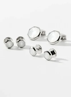 White mother-of-pearl cuff links and shirt buttons