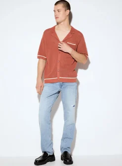 Worn faded blue jean